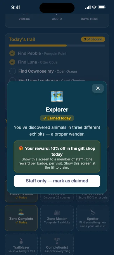 The Explorer badge with a 10% gift shop reward and a staff-only claim button