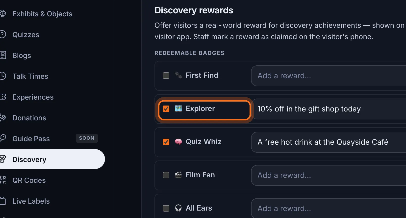 Step 2: Under Redeemable badges, rest the pointer on a badge's name to see what earns it.